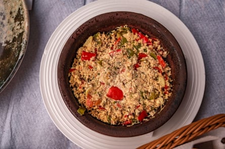 A plate of fergesë, made with red peppers and feta cheese.
