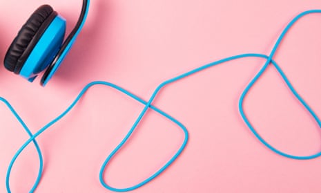 Headphones on blue and pink background