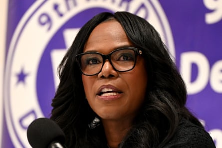 a woman in front of a microphone