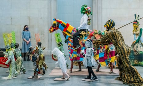 a colourful procession of life-sized figures