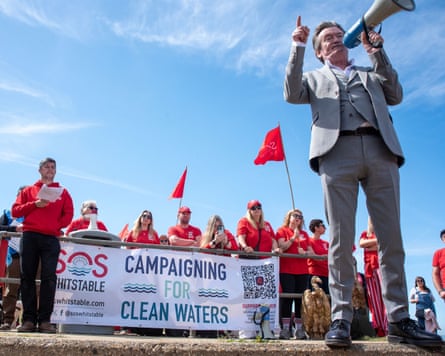 Feargal Sharkey gives a speech to protesters by the Southern Water site on Tankerton Beach