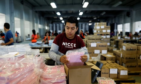 An employee arranges ballots at a warehouse before Sunday’s first-round general election, in Guatemala City, Guatemala on Tuesday.