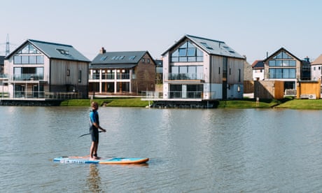 10 of the best travel companies committed to climate action 14 Paddleboarding on Beaumont Lake, Silverlake, Dorset.