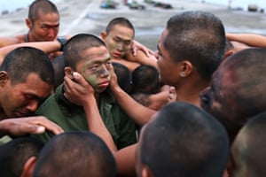 Ma Shuo-Fu, a trainee, is encouraged to stay on the program by his fellow trainees
