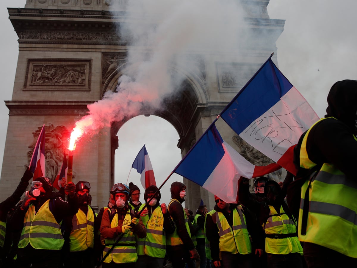 Macron Scraps Fuel Tax Rise In Face Of Gilets Jaunes Protests