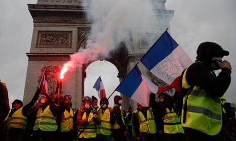 Yellow vests protest in Paris against fuel price rises