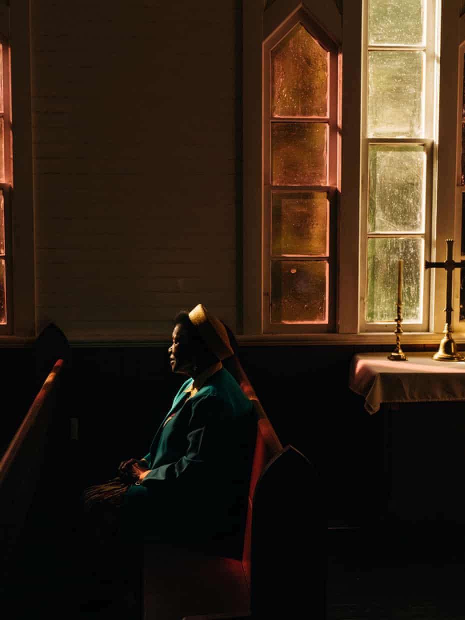 An image of a woman in a church in Georgia, US, from Robbie Lawrence's book Blackwater River