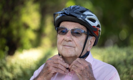 Trevor Gough, aged 85, wearing a bike helmet and glasses.