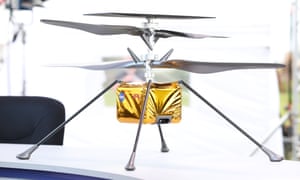 A close-up view of a full-size model of the Ingenuity helicopter