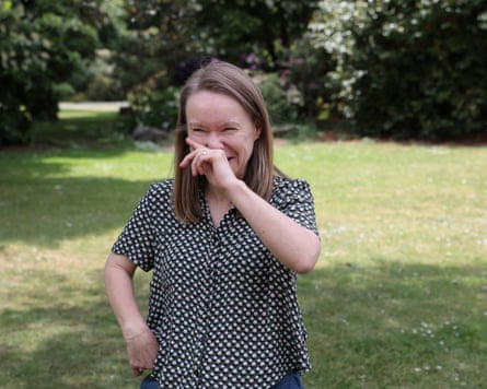 Jane Hoskyn stands in a park in Southampton rubbing her nose