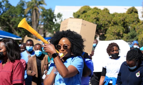 Nurses and other health workers stage a protest at Harare’s Parirenyatwa hospital in June 2022.