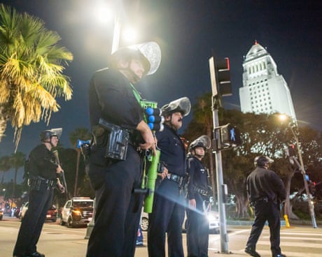 LA protests: LAPD says it has made ‘mass arrests’ after mayor issued curfew for downtown – live