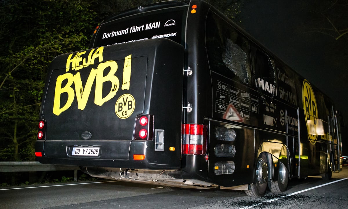Borussia Dortmund team bus hit by three explosive devices, injuring player  | Borussia Dortmund | The Guardian