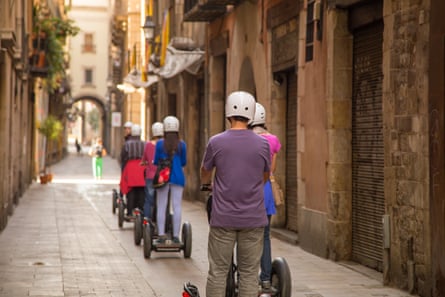 People driving Segway take over the streets of Barcelona.