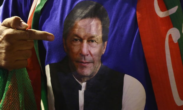 A supporter of incumbent ruling Tehrik-e-Insaf party celebrates after Imran Khan dissolved the national assembly.