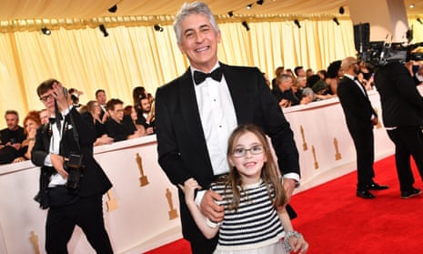 US-ENTERTAINMENT-FILM-AWARD-OSCARS-ARRIVALSUS film director Alexander Payne and his daughter attend the 96th Annual Academy Awards at the Dolby Theatre in Hollywood, California on March 10, 2024. (Photo by Valerie Macon / AFP) (Photo by VALERIE MACON/AFP via Getty Images)