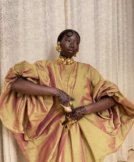 Multidisciplinary artist Aminata Mboup displays her henna designs.