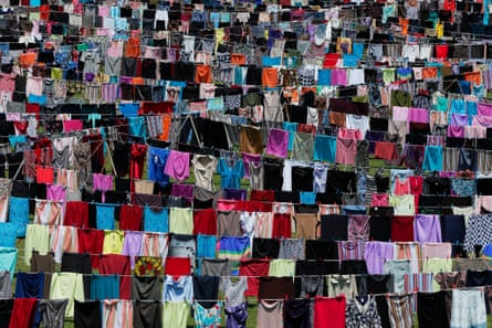 A view of the art installation ‘Thinking of You’ in Pristina, Kosovo, 12 June 2015. Thousands of women’s dresses and skirts are hanging on clotheslines across the pitch of the capital city’s main soccer stadium
