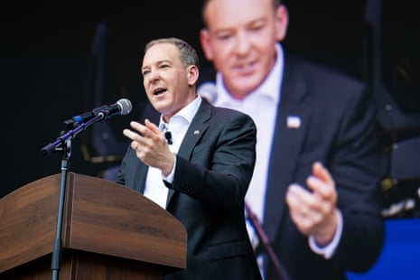 a man speaks into a microphone