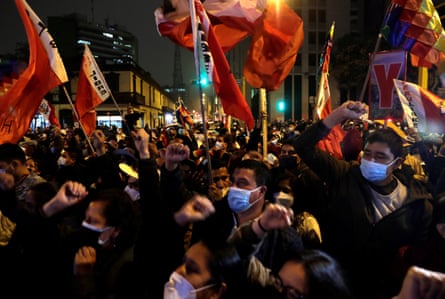 Supporters of Pedro Castillo celebrate his proclamation as president-elect of Peru in Lima on Monday night.