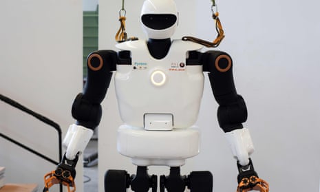 A robot with a white body and black arms