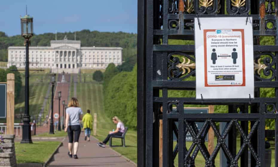 A 2-metre physical distancing sign at the entrance gate to the Stormont estate in Belfast.