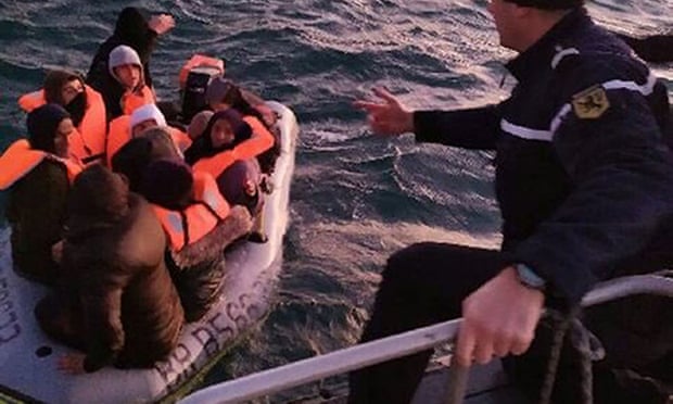 People being rescued from the Channel on Friday after their boat started taking on water.
