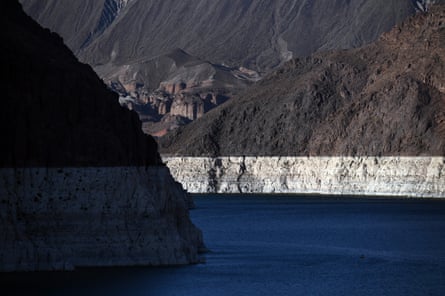 The white ‘bathtub ring’ of Lake Mead, mineral deposits left by higher levels of water, have been exposed as water levels dwindle.