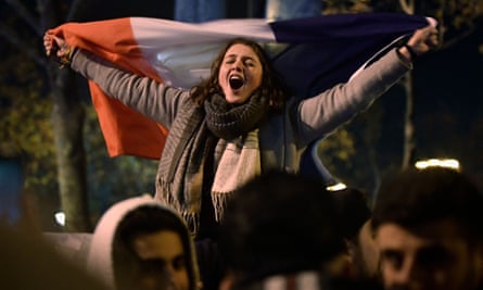 Woman waving flag and singing