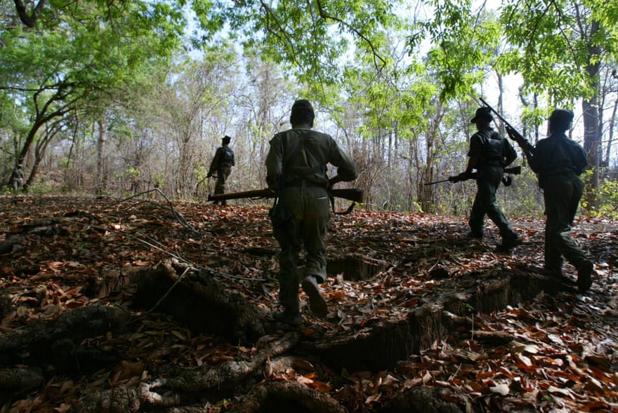 Naxalite fighters in the forests of Chhattisgarh in 2007: Korsa Joga had been a member of the revolutionary group for many years.