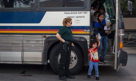 Immigrants are dropped off at a bus station shortly after being released from detention in June 2018 in McAllen, Texas.