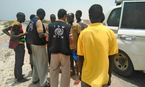 Staff assist Somali and Ethiopian migrants