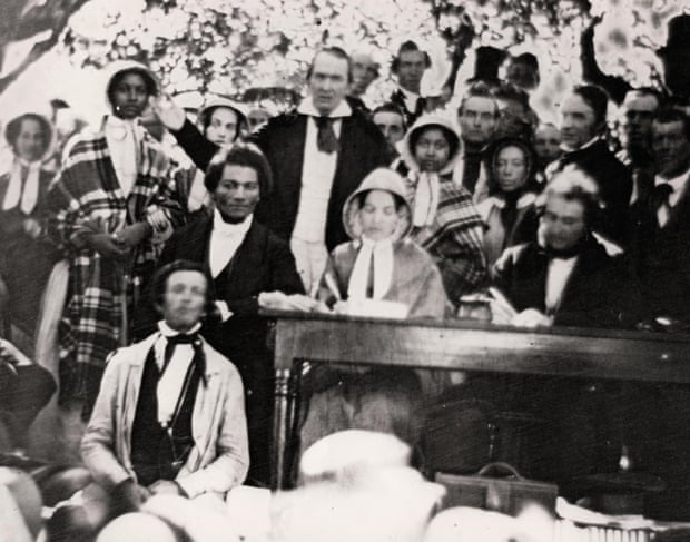 A daguerreotype of the Fugitive Slave Law Convention at Cazenovia, New York, on 22 August 1850, Douglass seated at left.