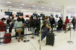 Passengers check in for Air New Zealand Flight 246 to Wellington.