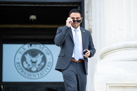 a man walking out of a building
