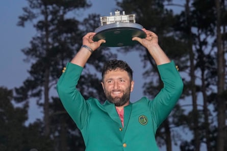 Jon Rahm holds up the trophy after winning last year’s Masters at Augusta National on 9 April 2023