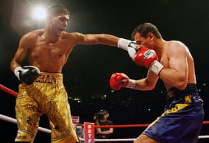 Amir Khan lands a left on Andreas Kotelnik.