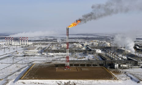 A flame burns from a tower at the Vankor oil and gas field in Russia owned by Rosneft