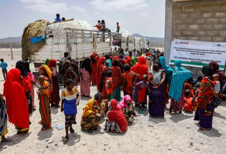 Internally displaced people from Abala wait to receive aid delivery in Afdera, Ethiopia, March 2022.
