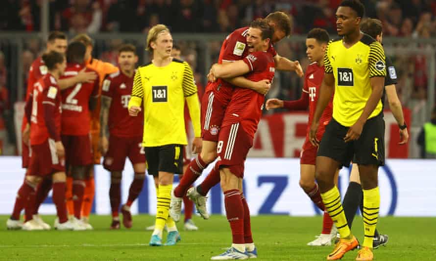 Bayern Munich's Leon Goretzka celebrates with Joshua Kimmich after winning the Bundesliga.