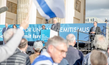Israel-Hamas war live: White House promises ‘continued flow’ of Gaza aid as Israel steps up airstrikes in north of strip | Israel-Hamas war 4 German President Frank-Walter Steinmeier speaks to the crowd.
