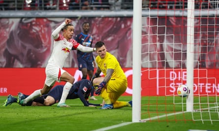 Yussuf Poulsen scores Leipzig’s second goal against Heidenheim.