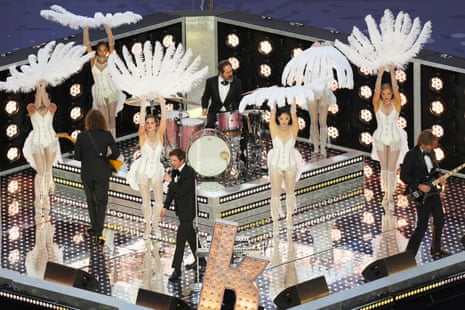 Brandon Flowers, lead singer of the rock band The Killers, performs during the opening ceremony ahead of the Champions League final.