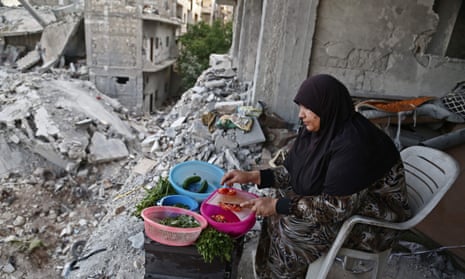 A Syrian woman cooks in Afrin. Displaced from their homes in Ghouta, families have sought refuge in abandoned houses in the traditionally Kurdish town