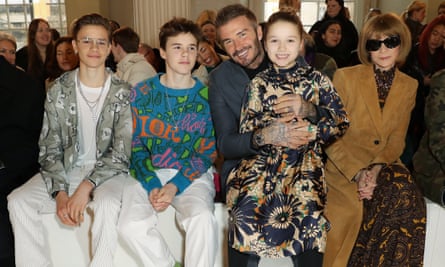 Harper Beckham, second from right, with dad David and Vogue's Anna Wintour at a fashion show in 2020.