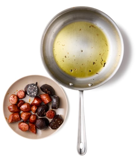 Felicity Cloake’s Portuguese feijoada 04a. Put the oil in a wide pan on a medium-high heat and, add the chouriço and morçela, if using, and saute until they begin to colour the oil. Carefully scoop out and set aside the fried sausages