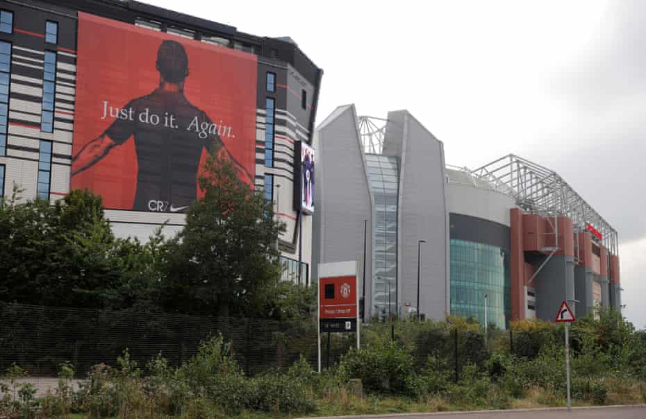 A huge Nike CR7 advert on the side of Hotel Football opposite Old Trafford