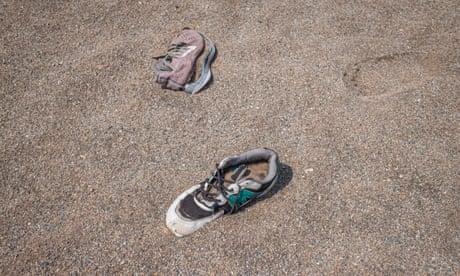 Battered shoes full of sand