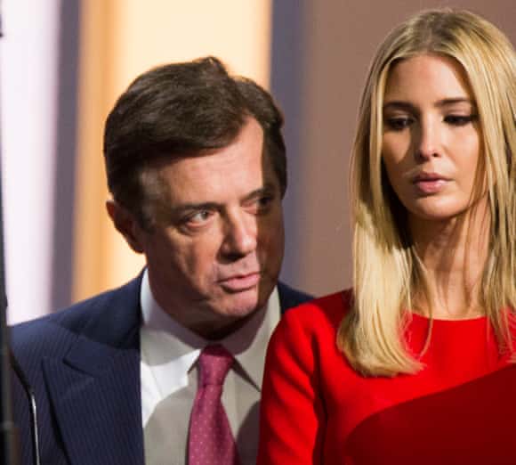 Paul Manafort, Trump's former campaign manager who has been charged over illegal lobbying, speaking to Ivanka Trump at the Republican Convention in Cleveland, Ohio in 2016. 