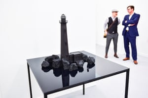 To the lighthouse: art lovers peruse a work.